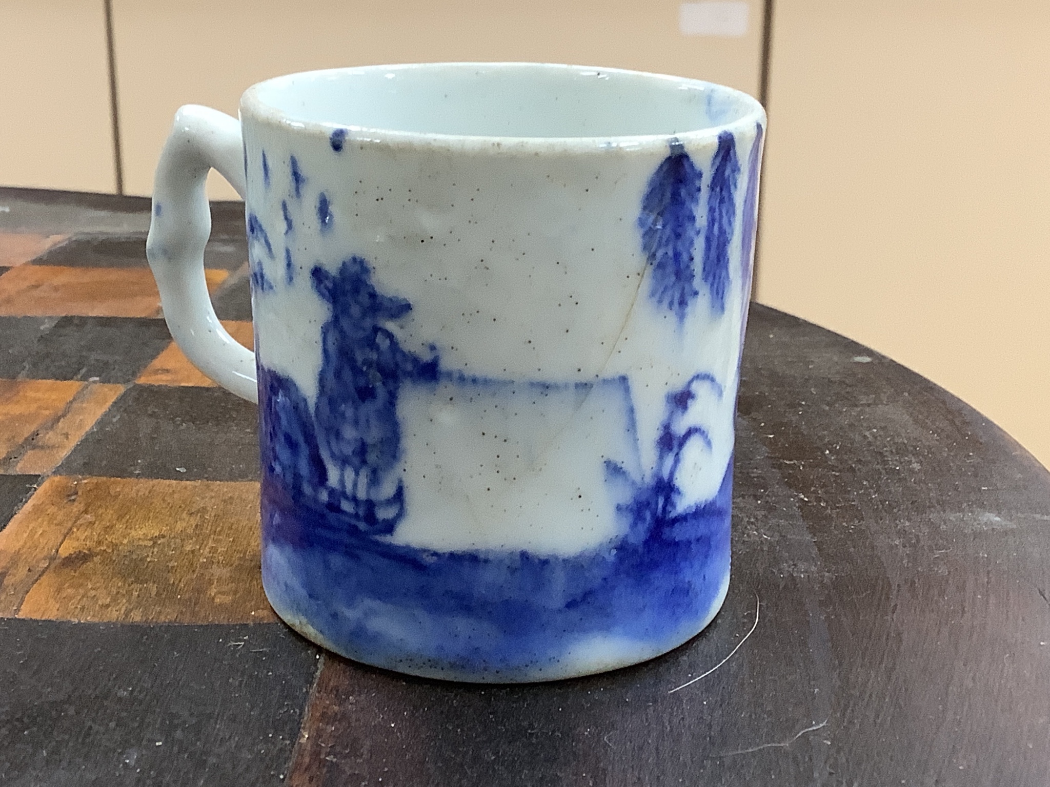 A large group of 18th century Worcester, Caughley and Liverpool blue and white tea bowls, coffee cups and saucers etc. including a Bow Cross-Legged Man